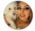 Woman smiling while posing with a dog